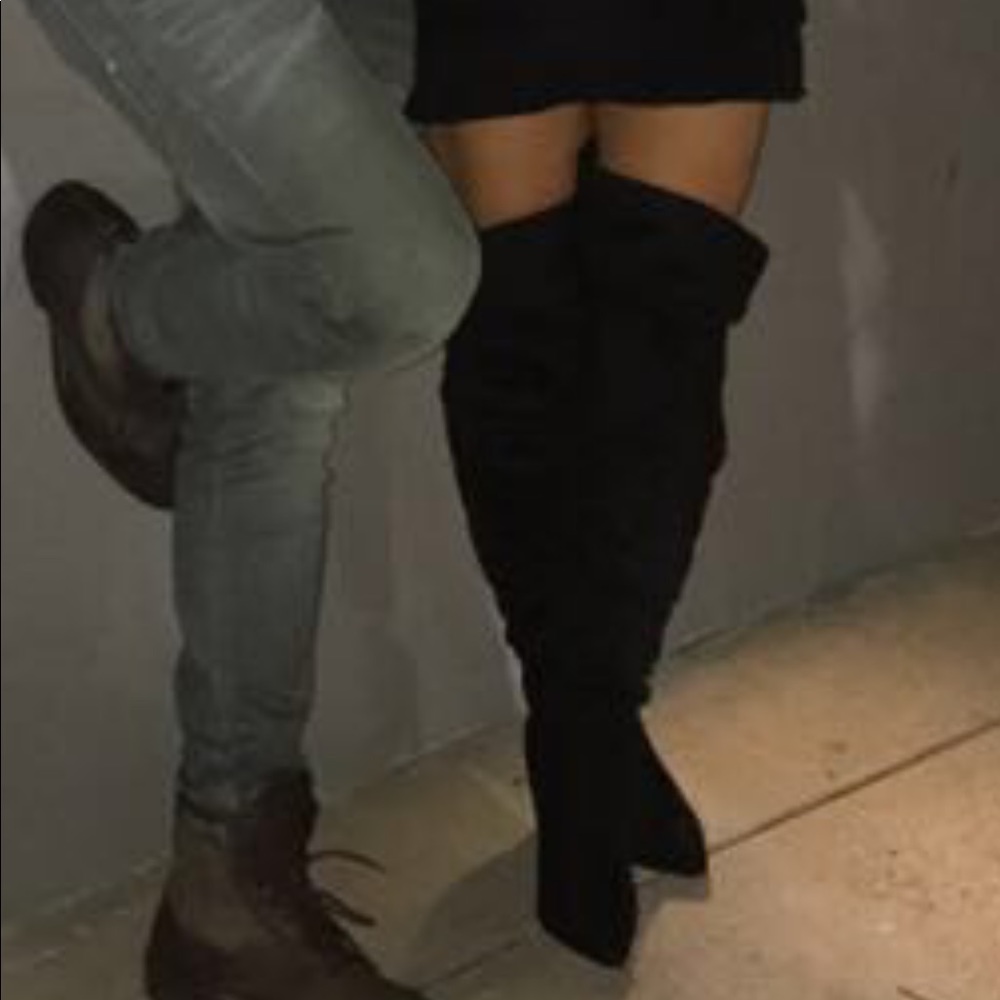 Black thigh high boots